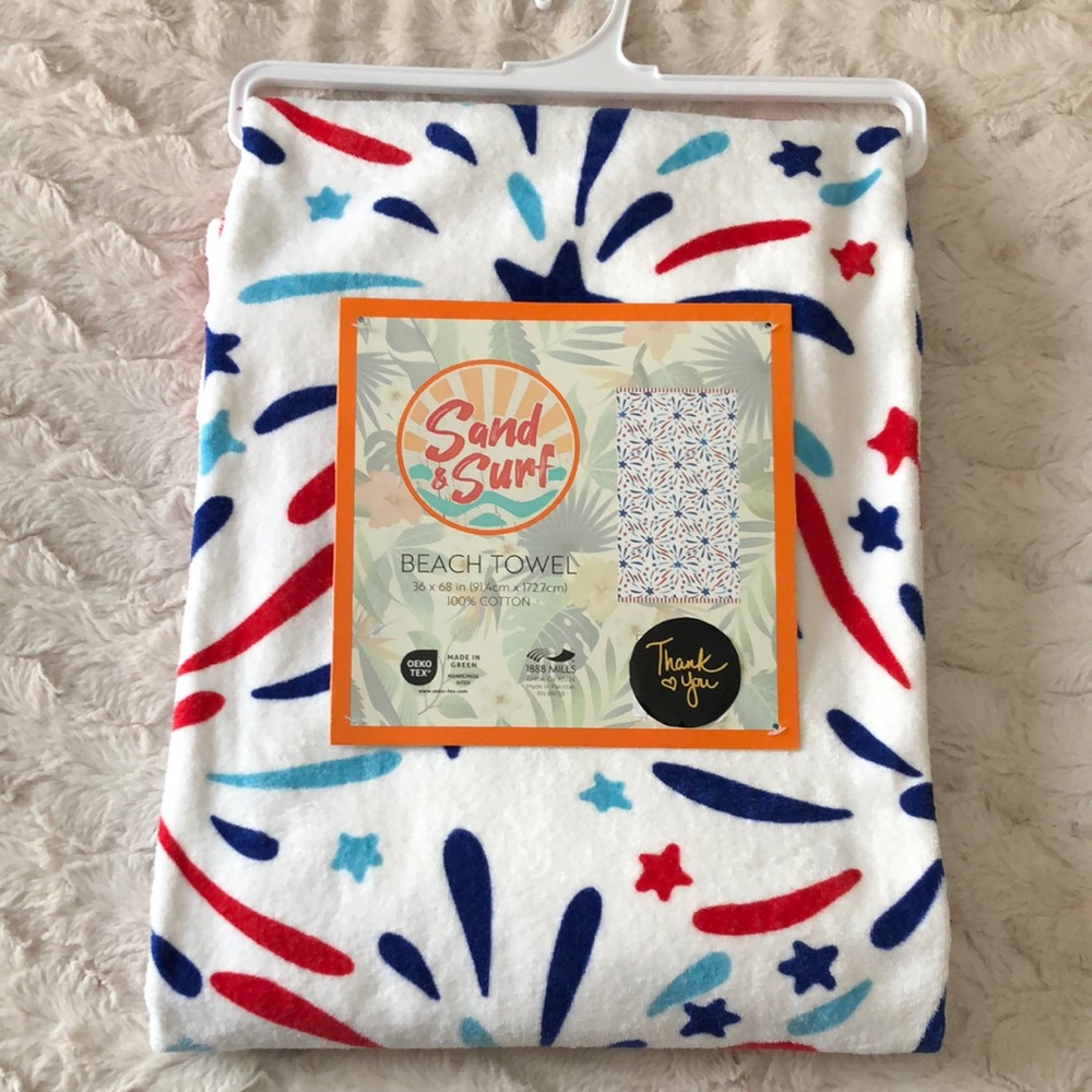 White Beach Towel with Red, Blue and Light Blue Starburst Print